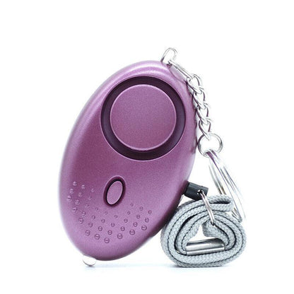 140DB Personal Alarm Keychain with LED Light for Emergency Alert and Assistance - Gold